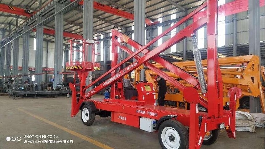 柴(chái)油曲臂式(shì)升降機1